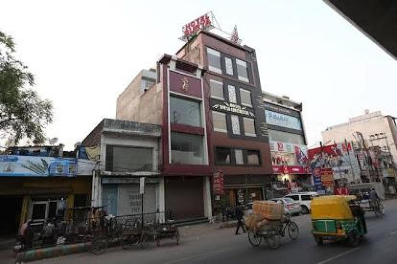 Capital O Hotel Surya Continental Lucknow Bagian luar foto